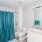shower/tub combo in bright bathroom