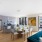 open concept apartment interior with oversized windows