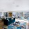 oversized windows brightens open living room