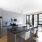 island seating in kitchen with large window