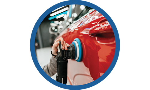 a person washing a car